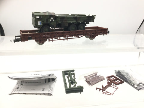 Roco 47625 HO Gauge Flat Wagon with IFOR Truck Load